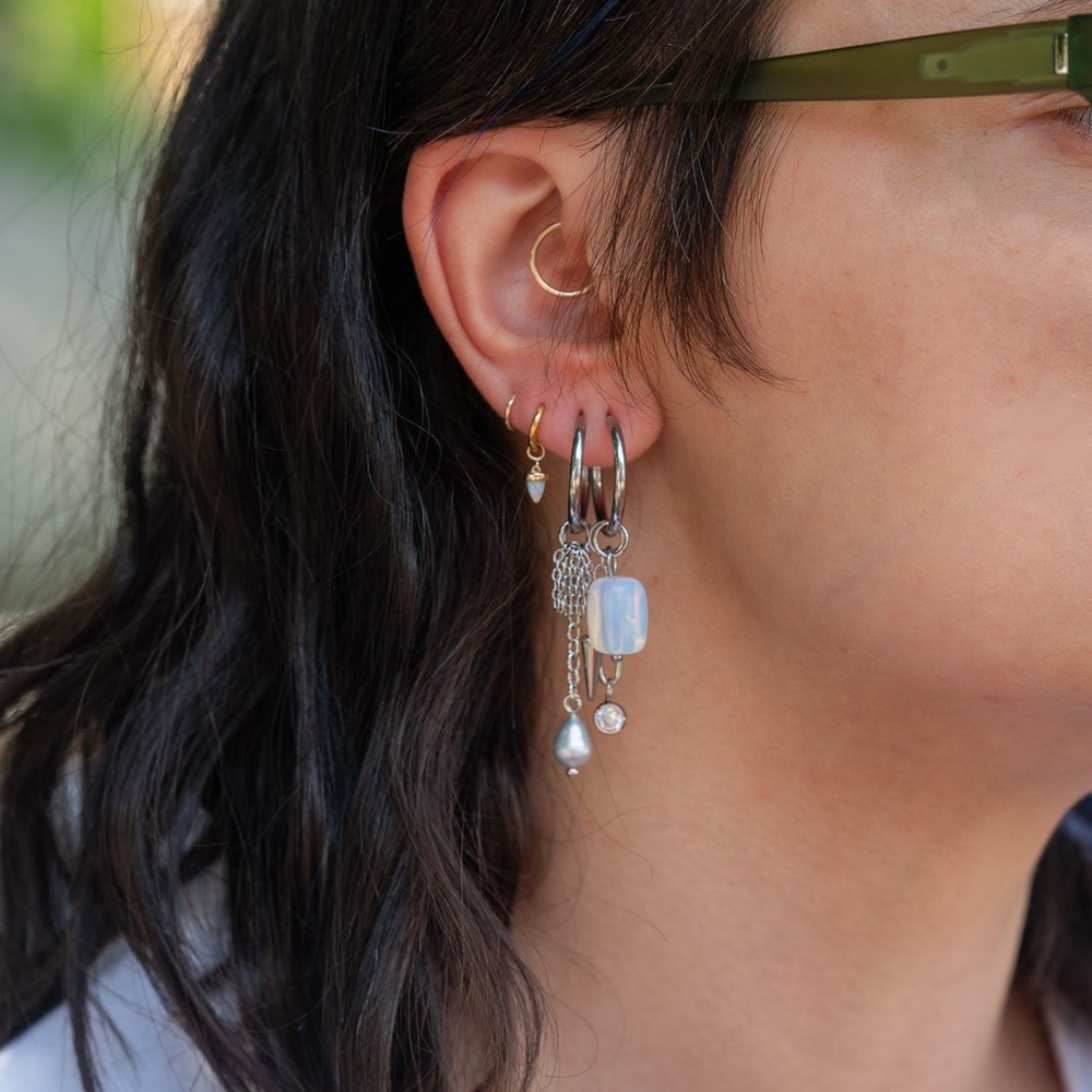 Spikes and Stars with opalite bead silver tone huggie earrings with charms